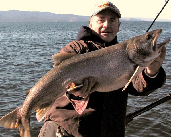 Photo of Fishing Guide Mike Howe with Lake Trout