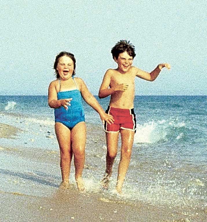 Tina and Scott Steele, as Children, Running Along the Beach