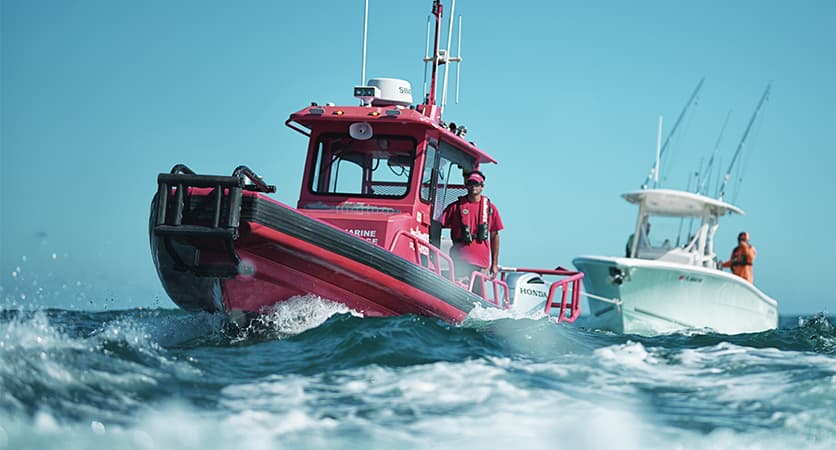 Towboat towing a customer's boat